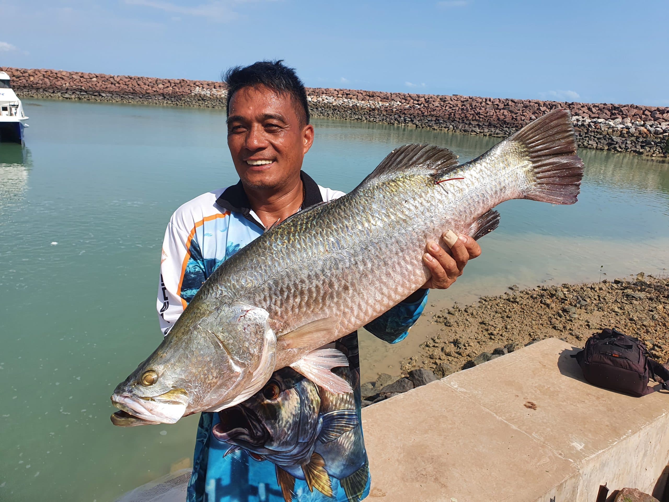 Danilo Mallari with his prize-tagged barra