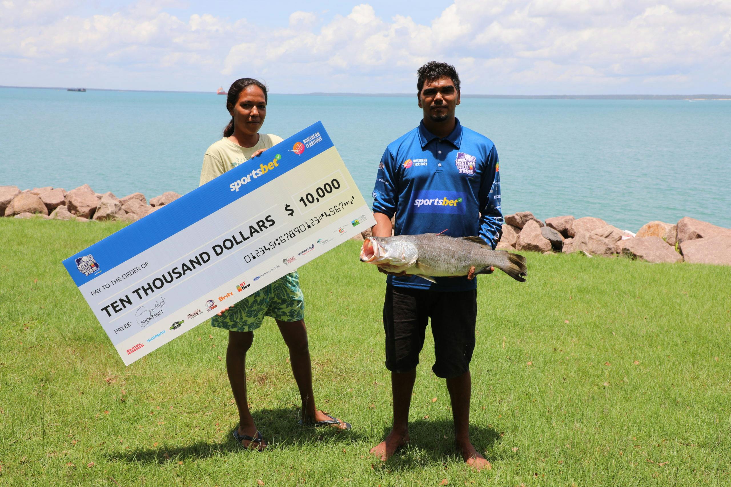 Darryl McLeod with his winning fish and partner Kaitlyn Ahfat, who caught a $10,000 fish in Season 6